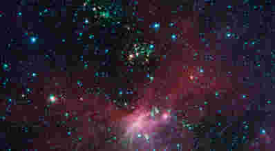 Spitzer观察银河系外缘恒星的诞生和死亡