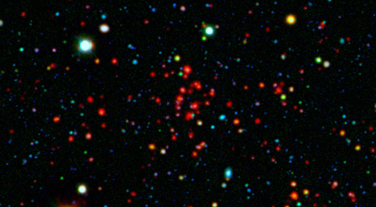 新的Spitzer研究分析了星系集群中的星形形成时代