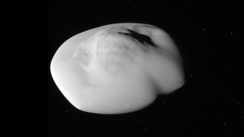美国宇航局的Cassini Spacecraft意见Saturn的“飞碟”月亮地图集关闭