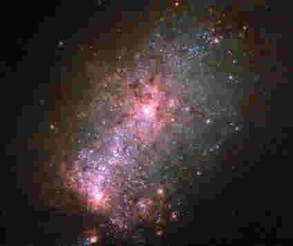 哈勃揭示了Galaxy NGC 3125的充满活力的核心