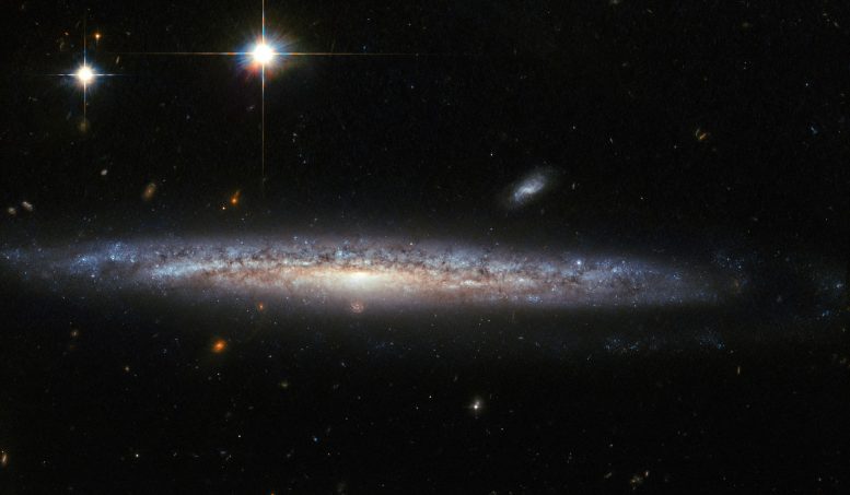 哈勃捕获了螺旋星系NGC 5714的惊人视图