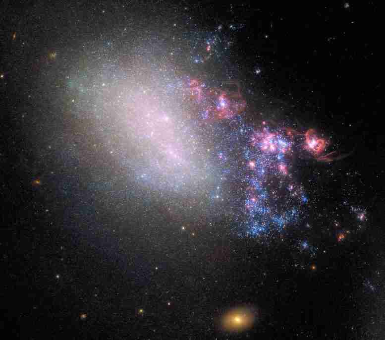 哈勃揭示了Galaxy Blazing与近距离遭遇出生的新星
