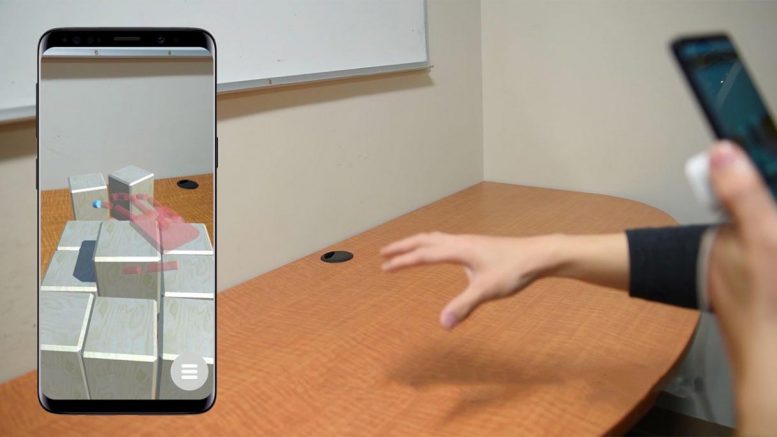 新的增强现实系统让智能手机用户用手操纵虚拟物体